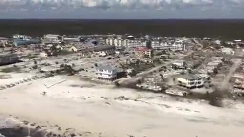 A USCG aircrew assesses the damage of Mexico Beach, Florida, from Hurricane Michael.webm